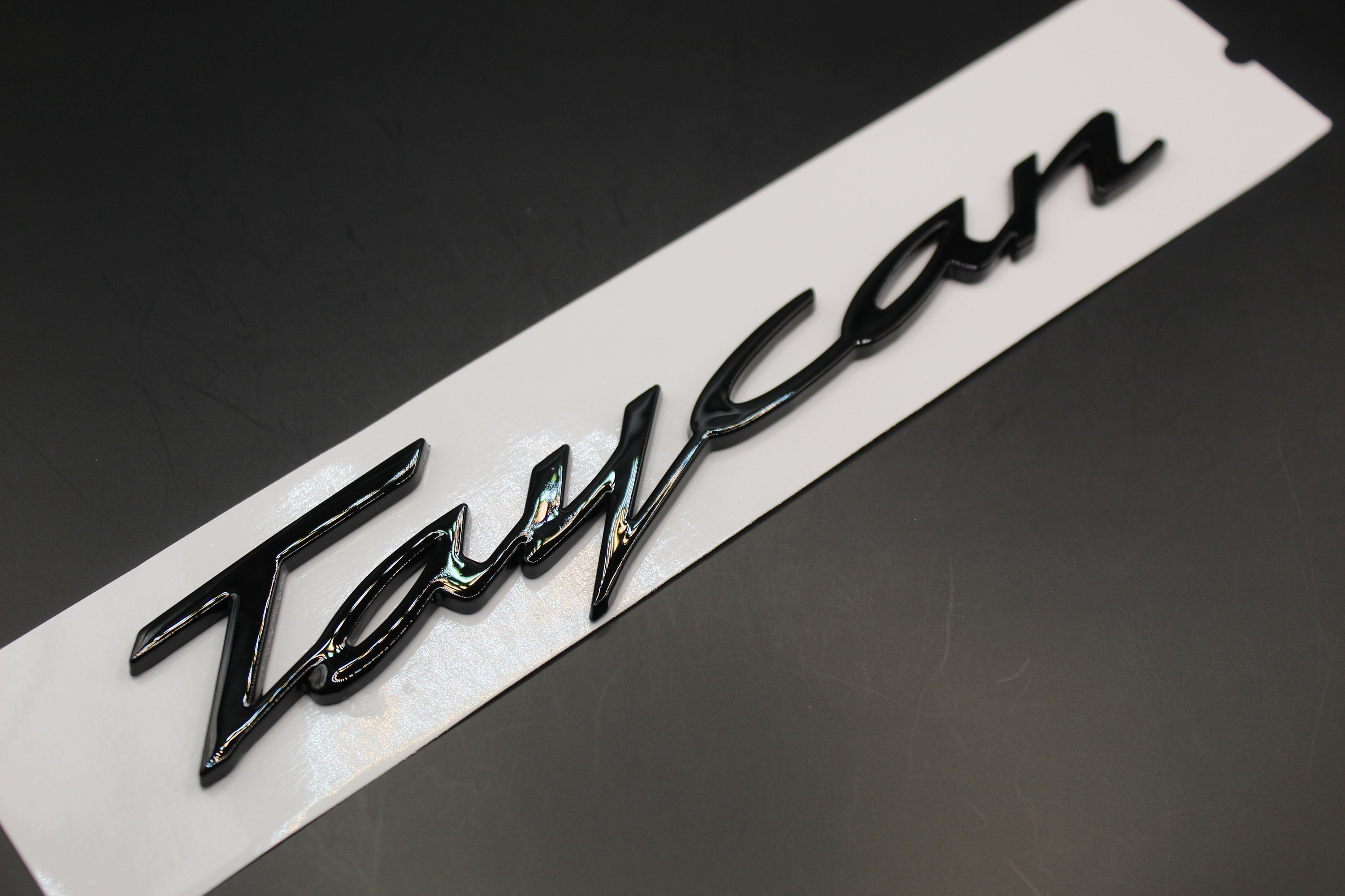 thumbnail image 2 of Gloss Black Rear Emblem Set For Porsche Taycan 4S - Direct Replacement Badges 2 of 5
